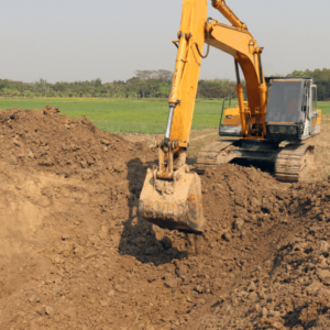 excavator digs in rich illinois soil